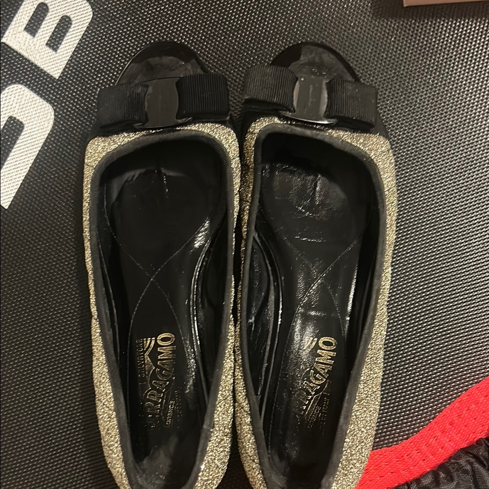 Ferragamo Black and Gold Women's Flats